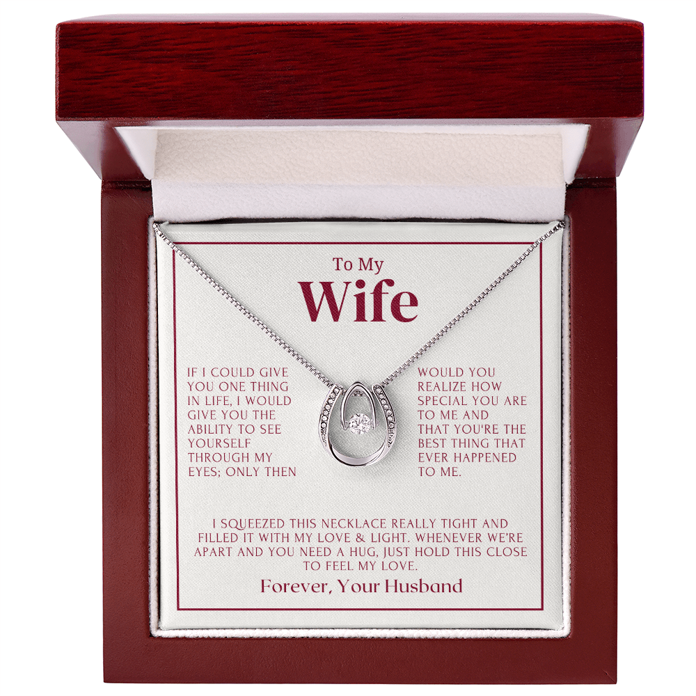 Fortune's Embrace necklace worn on a woman